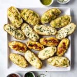 twice baked potatoes with a variety of toppings