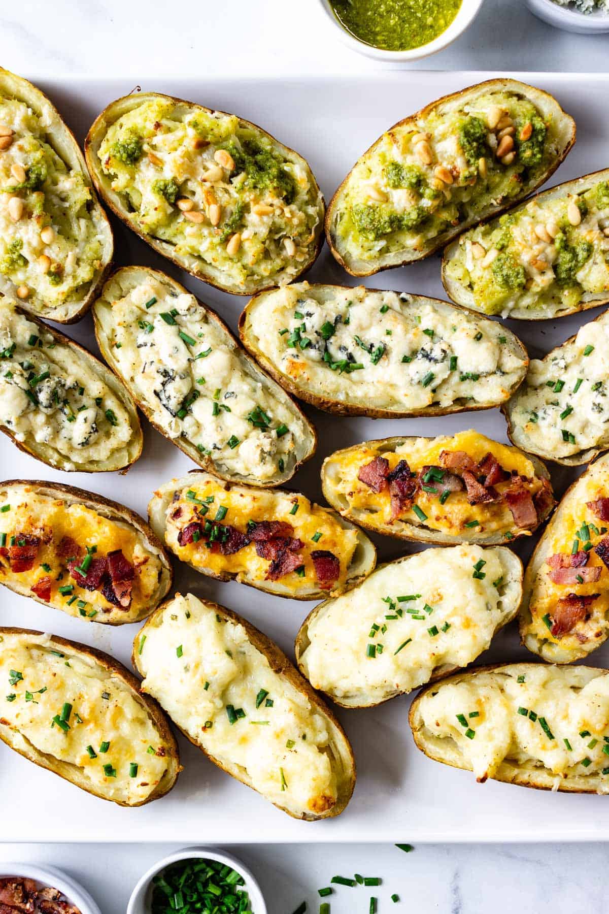 twice baked potatoes with a variety of toppings