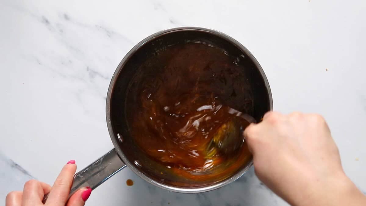 Making orange sauce for orange chicken.