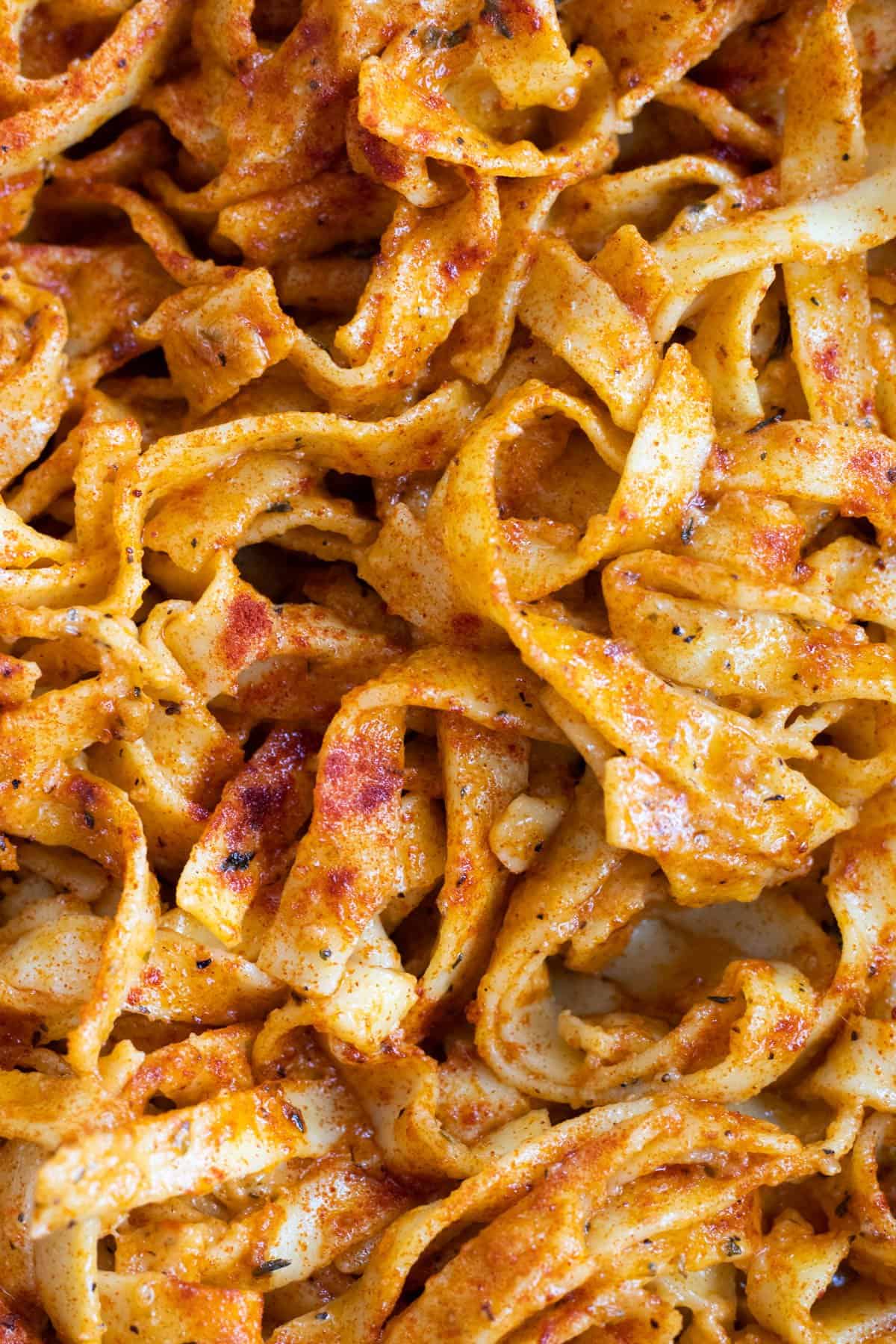 close up of cajun alfredo sauce with pasta