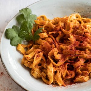 cajun alfredo sauce with pasta in a bowl