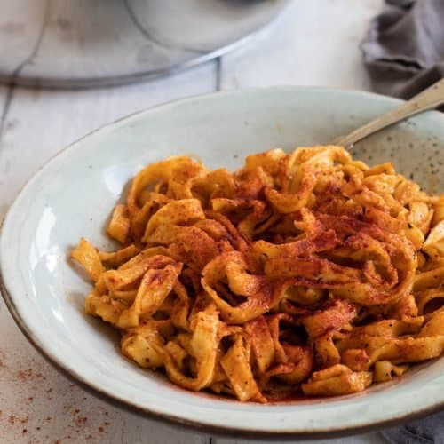 cajun alfredo sauce with pasta in a bowl