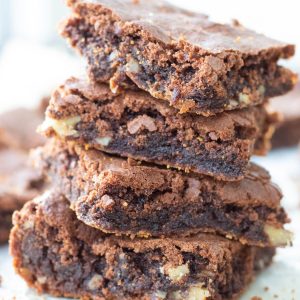 A stack of walnut brownies.