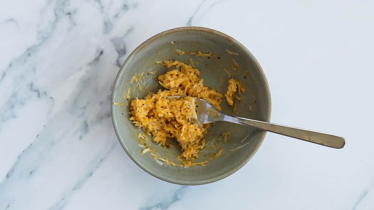 Cheese and egg paste in a bowl.