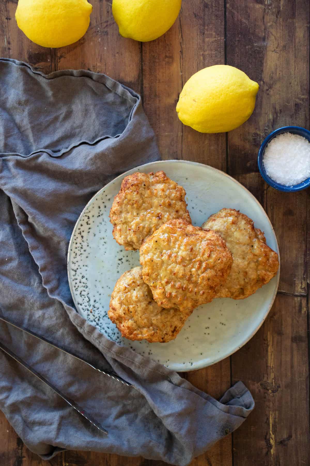 Chicken patties on a blue plate.