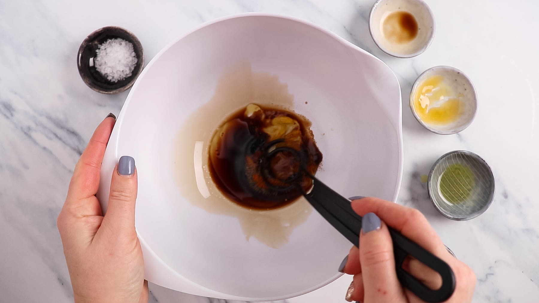 Making vinaigrette.