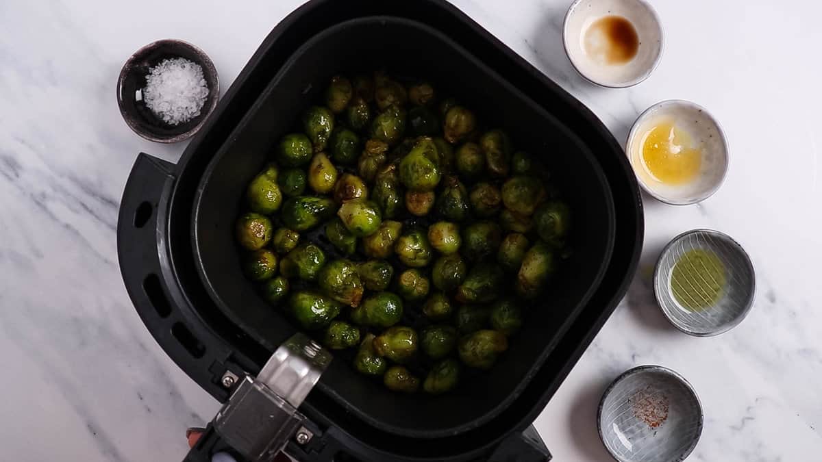 Brussels sprouts with vinaigrette in air fryer.
