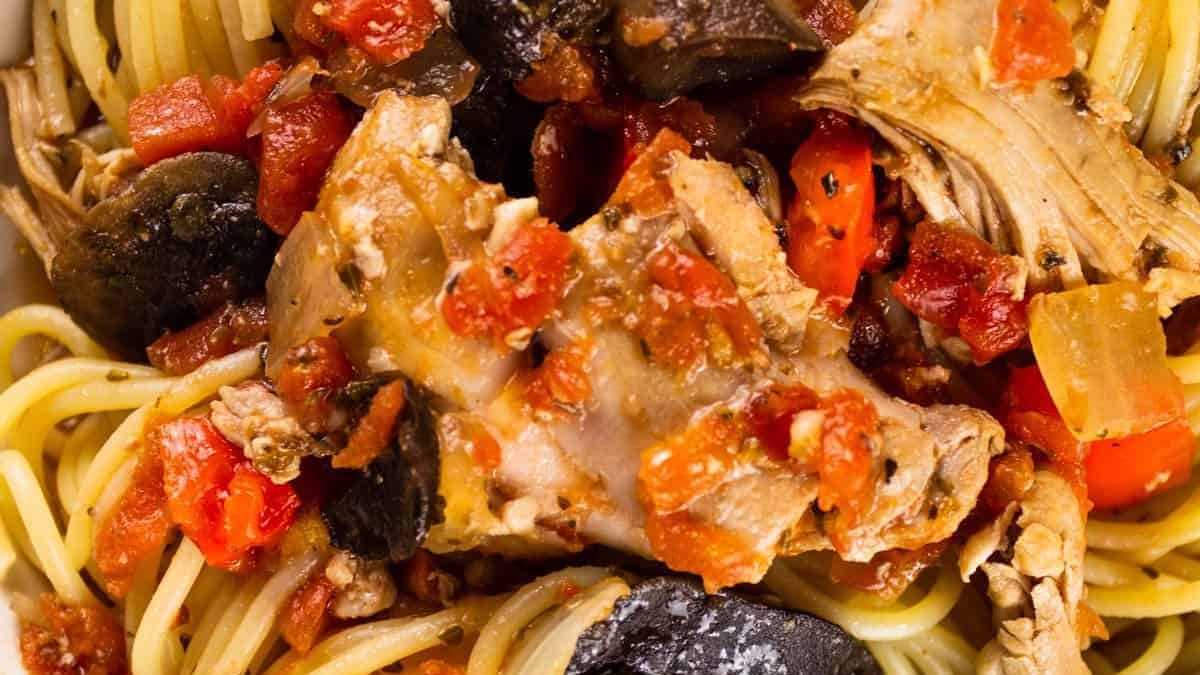 Chicken cacciatore with pasta.