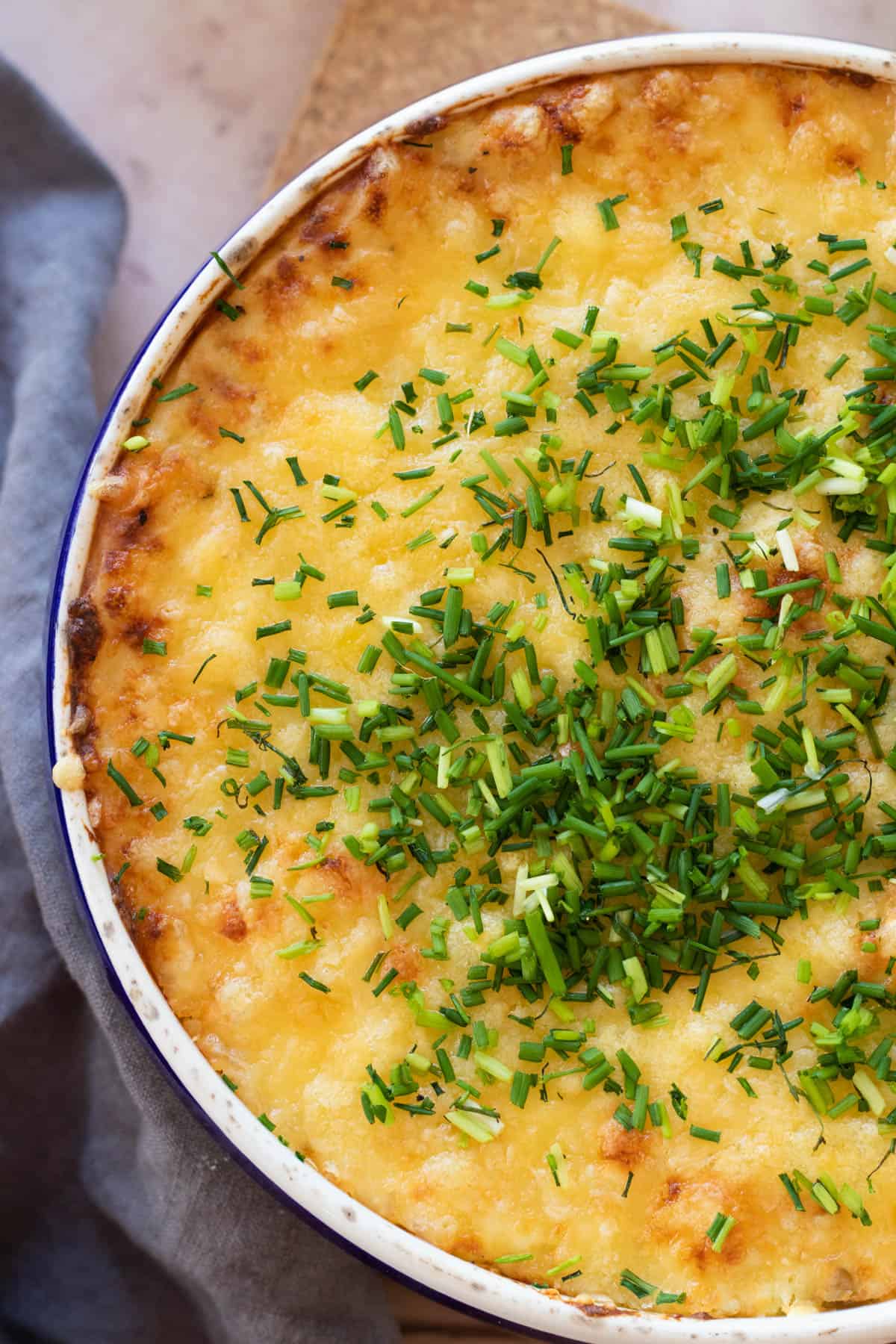 Leftover boiled potato casserole topped with chives.