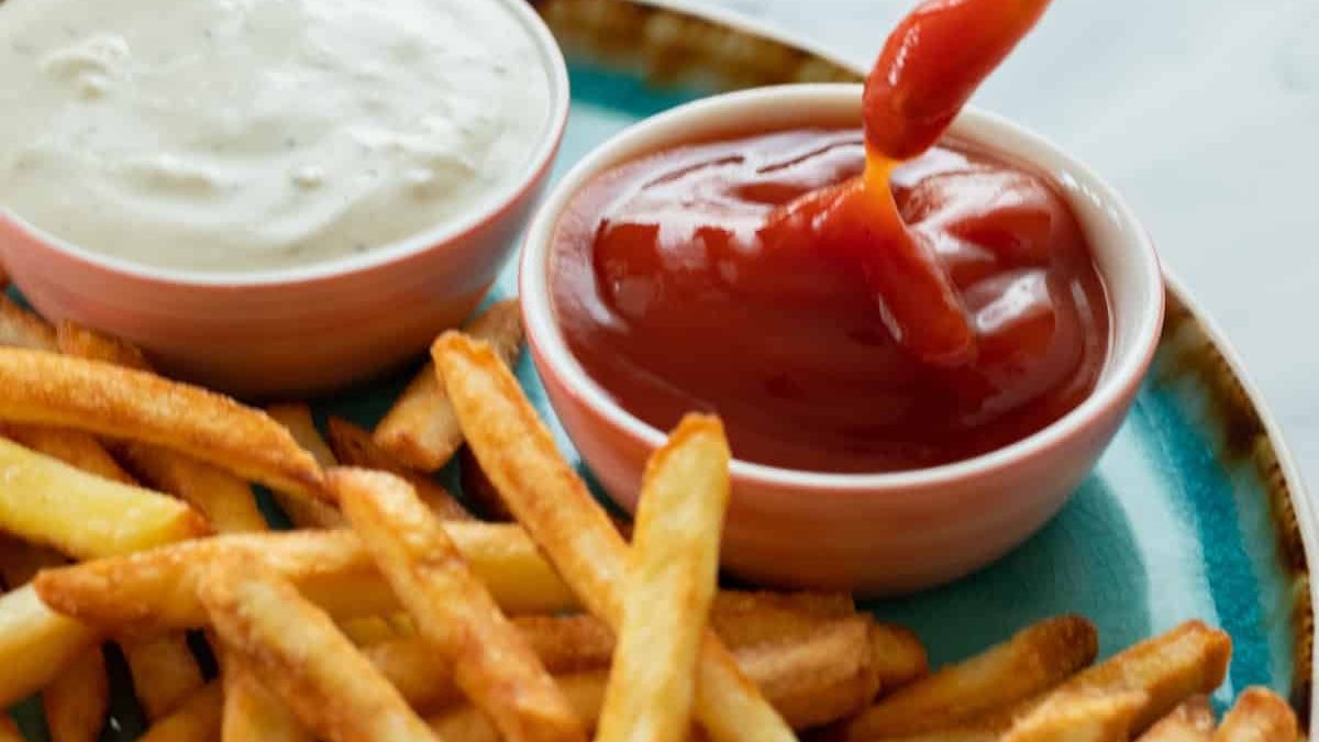 Air fried frozen french fries and dip sauces.
