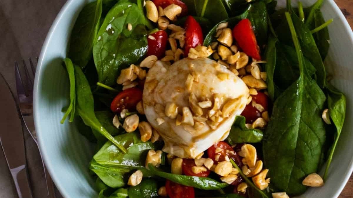 Caprese salad with cashews.