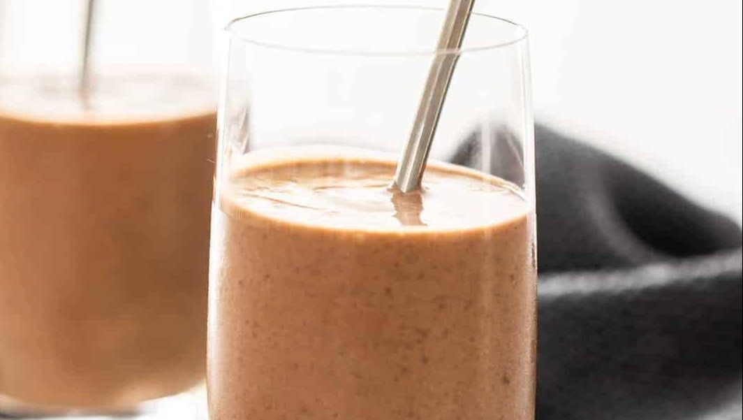 Chocolate black bean smoothie in a glass.
