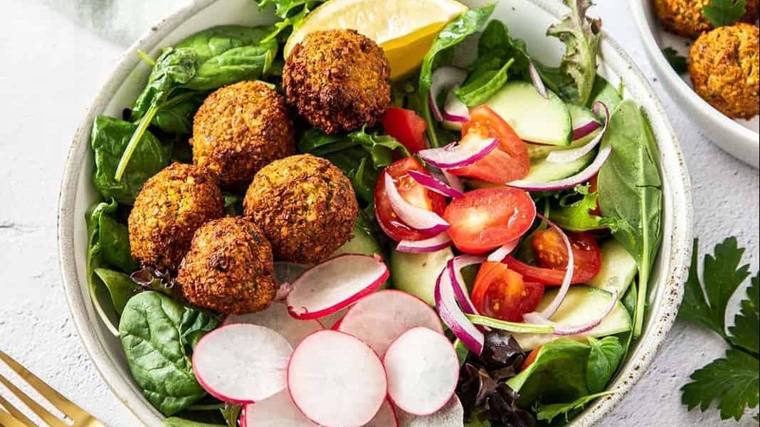 Falafel in a bowl with salad.