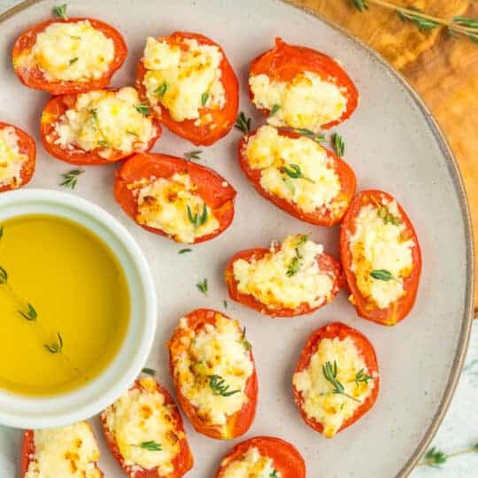 Grilled tomatoes with cheese.