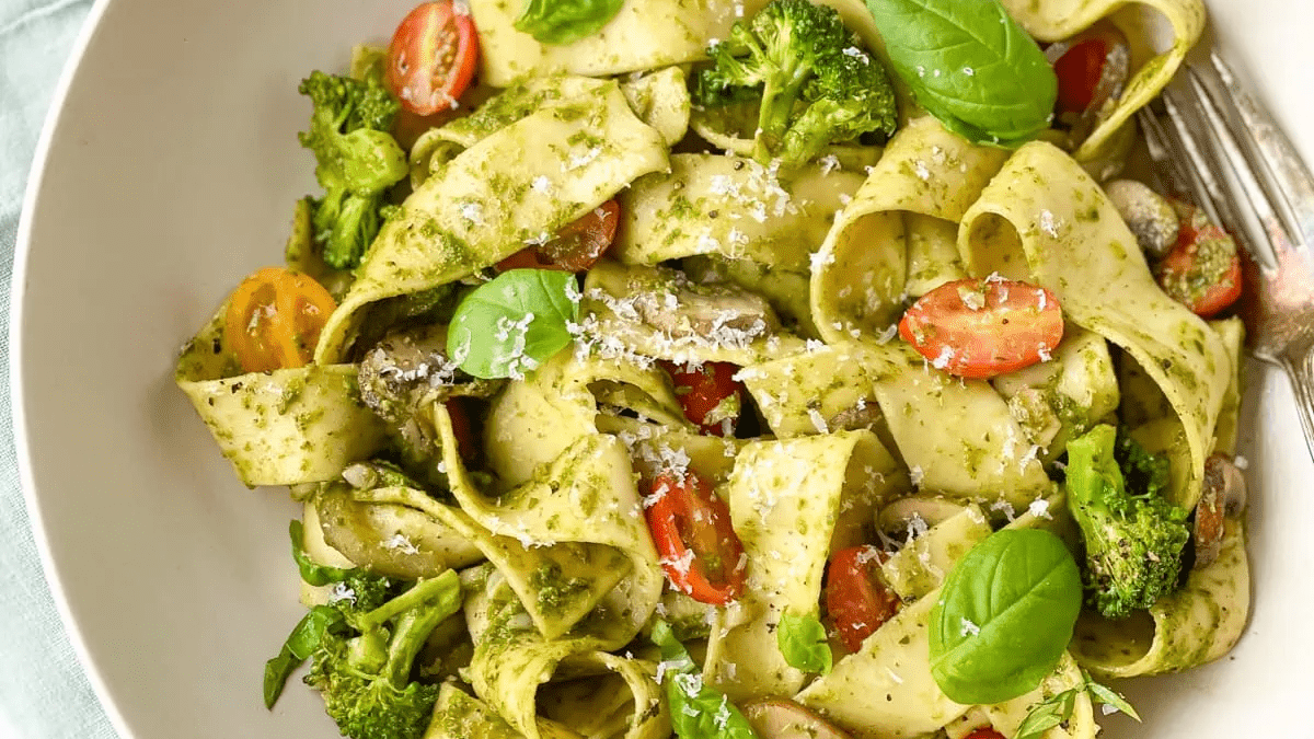 A bowl of pappardelle pesto pasta.