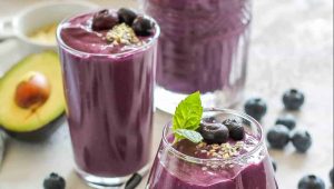 3 glasses of blueberry smoothie.