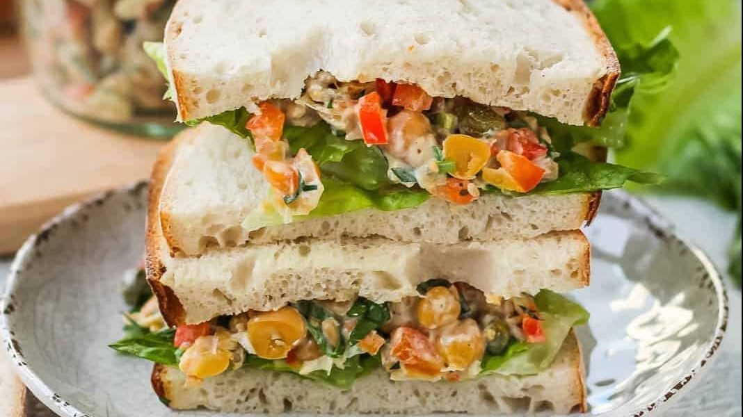 Chickpea salad sandwich on a plate.