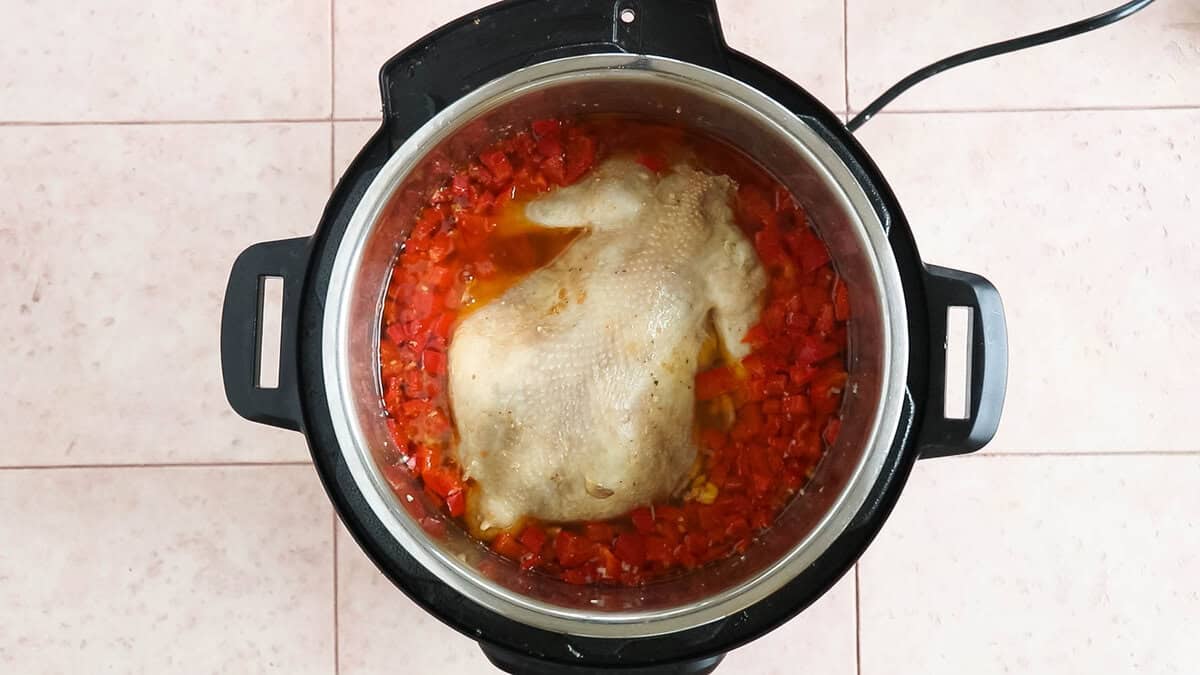 Chicken, mushrooms, bell peppers and chicken broth after pressure cooking.