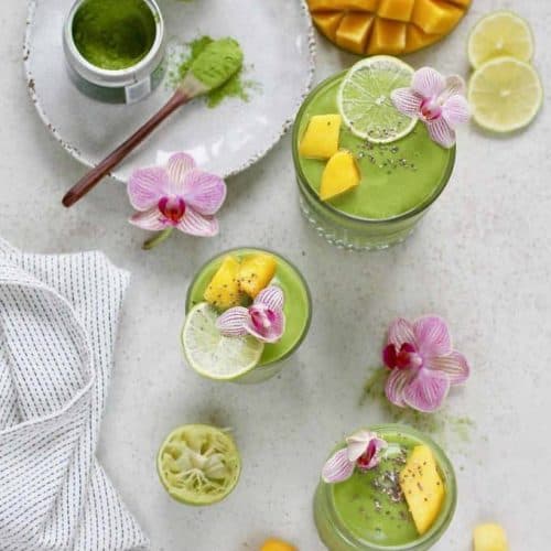 Three glasses of mango matcha green tea smoothie.