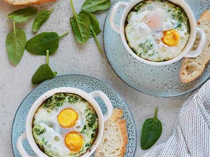Two dishes with ricotta spinach egg bake.