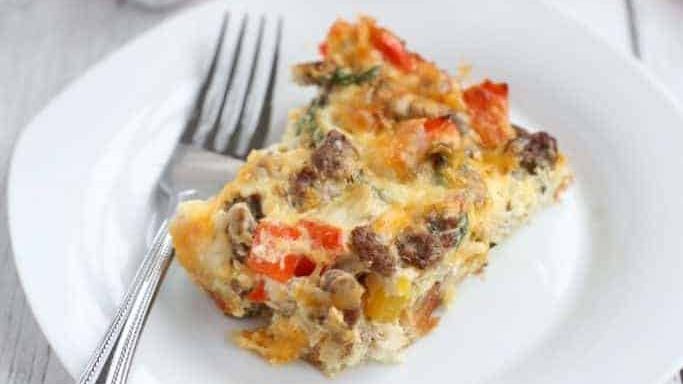 Sausage and egg casserole on a plate.