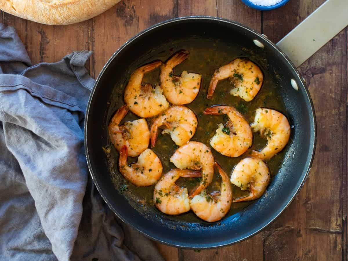 Shrimp scampi in a pan.