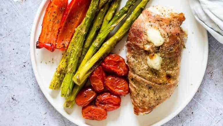 Baked prosciutto wrapped chicken.