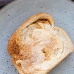 A slice of buttered air fryer toast.