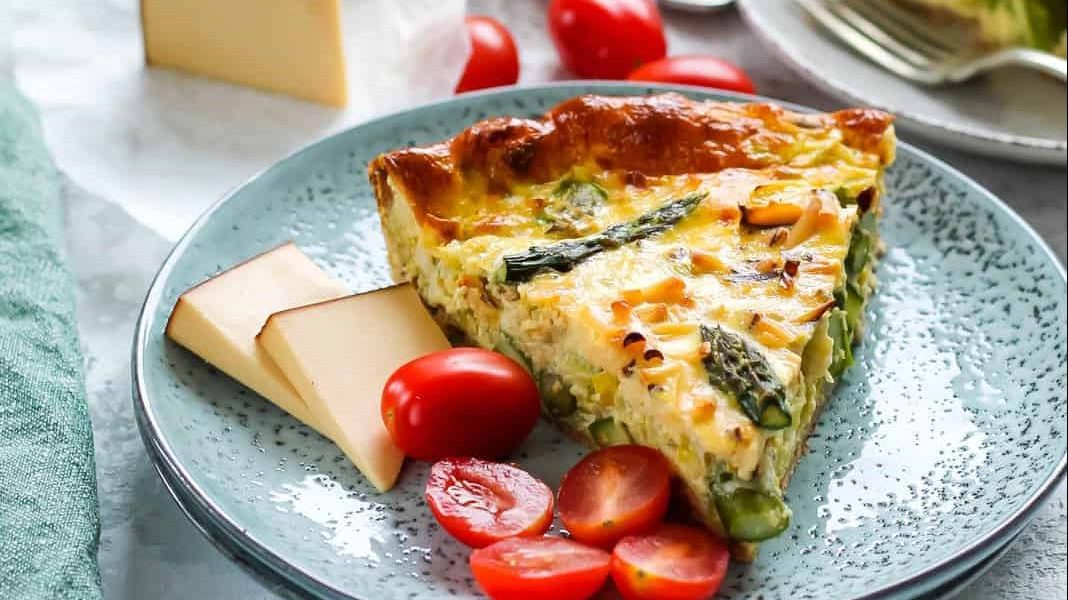 Asparagus quiche on a plate.