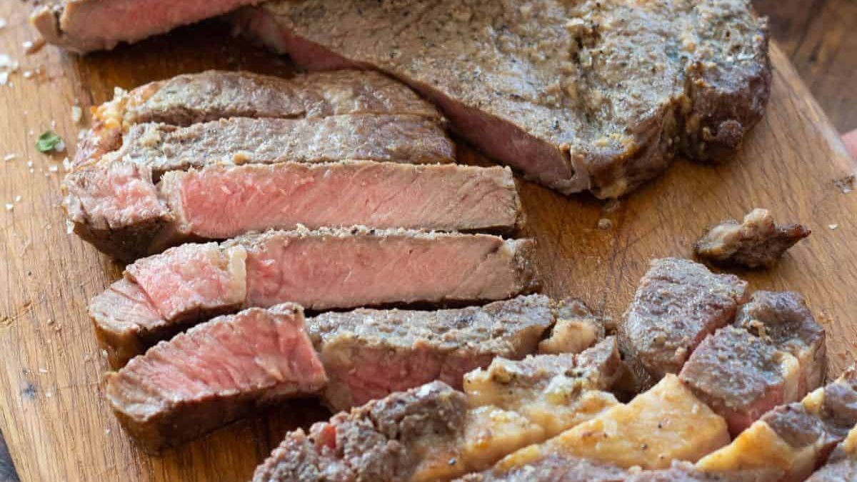 A sliced rib eye steak.