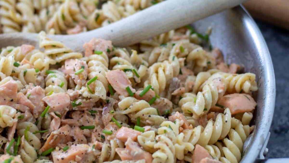 Salmon creme fraiche pasta in a pan.