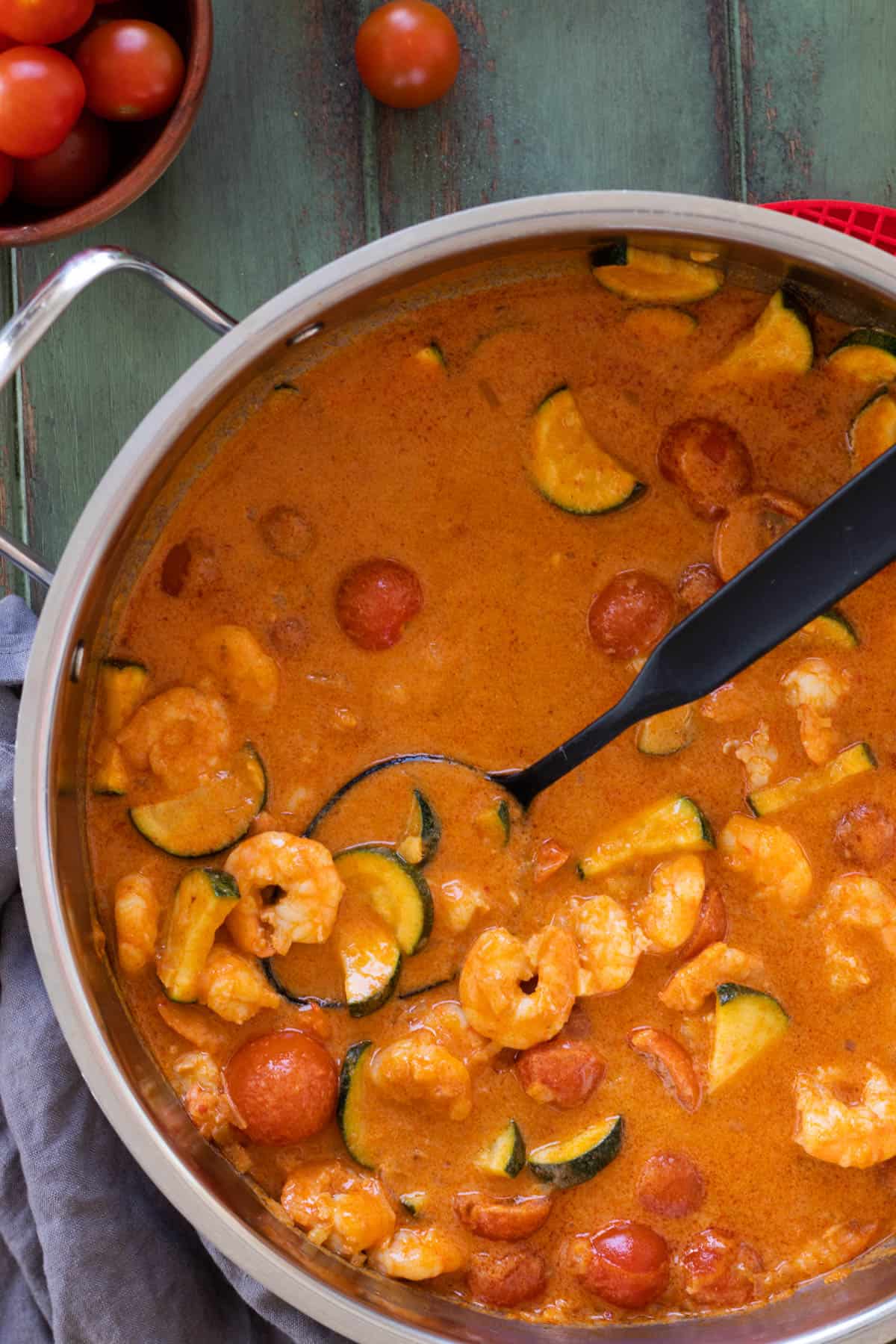 Shrimp curry in a skillet.