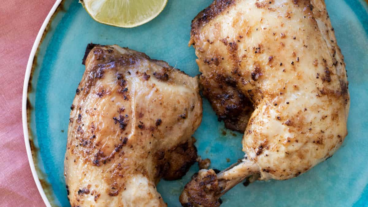 Chicken legs marinated in Mexican chicken marinade.