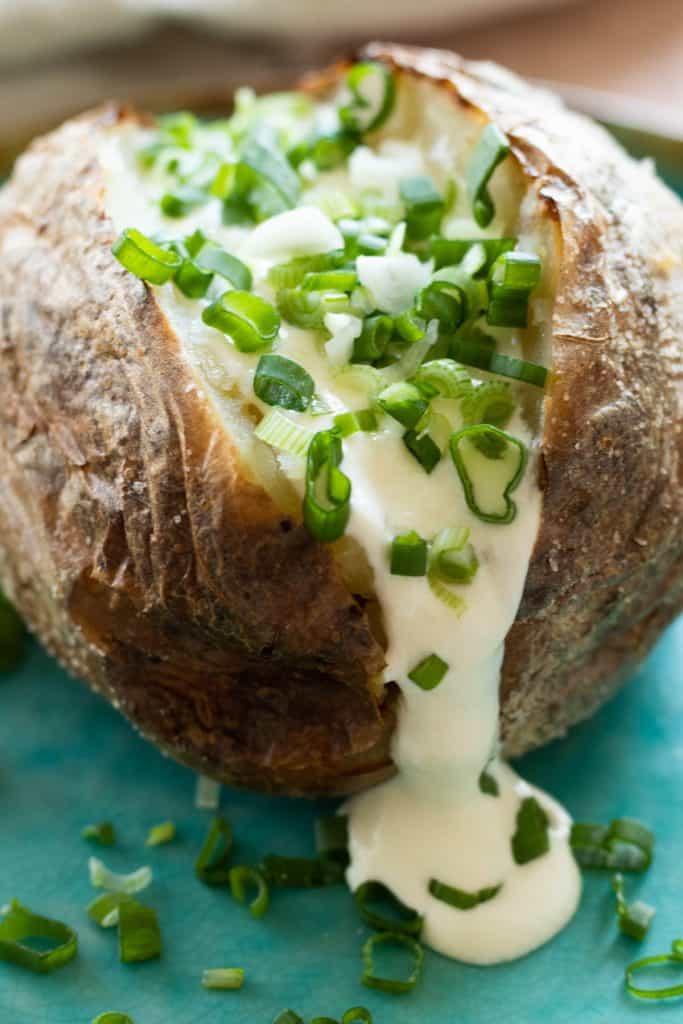 Air Fryer Baked Potatoes - always use butter