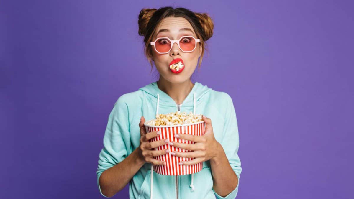 Woman eating Popcorn