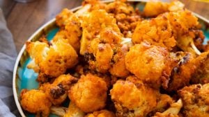 A plate full of buffalo cauliflower wings.