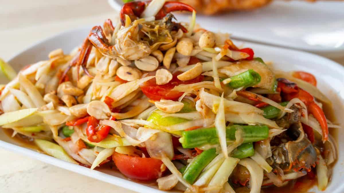 A plate full of Thai papaya salad.