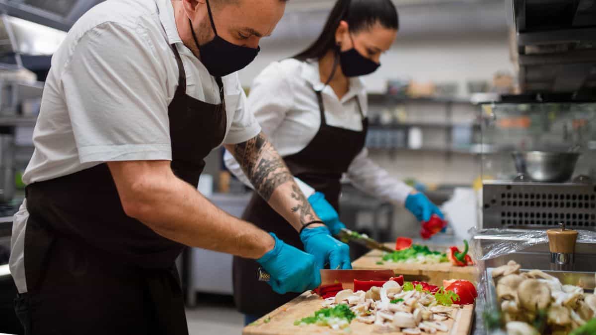 A chef chopping vegetables.