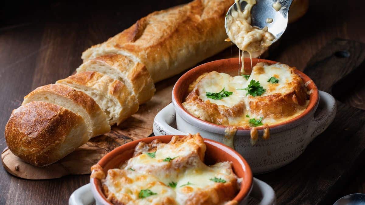 Two bowls with French onion soup.