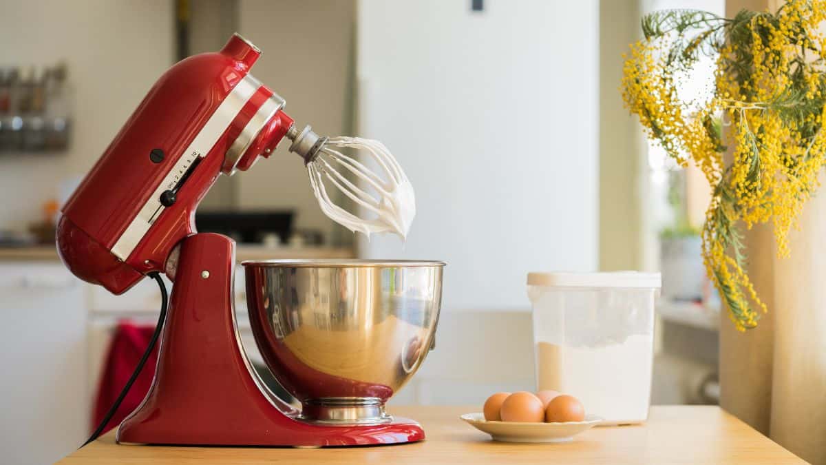 A stand mixer with whipped cream.