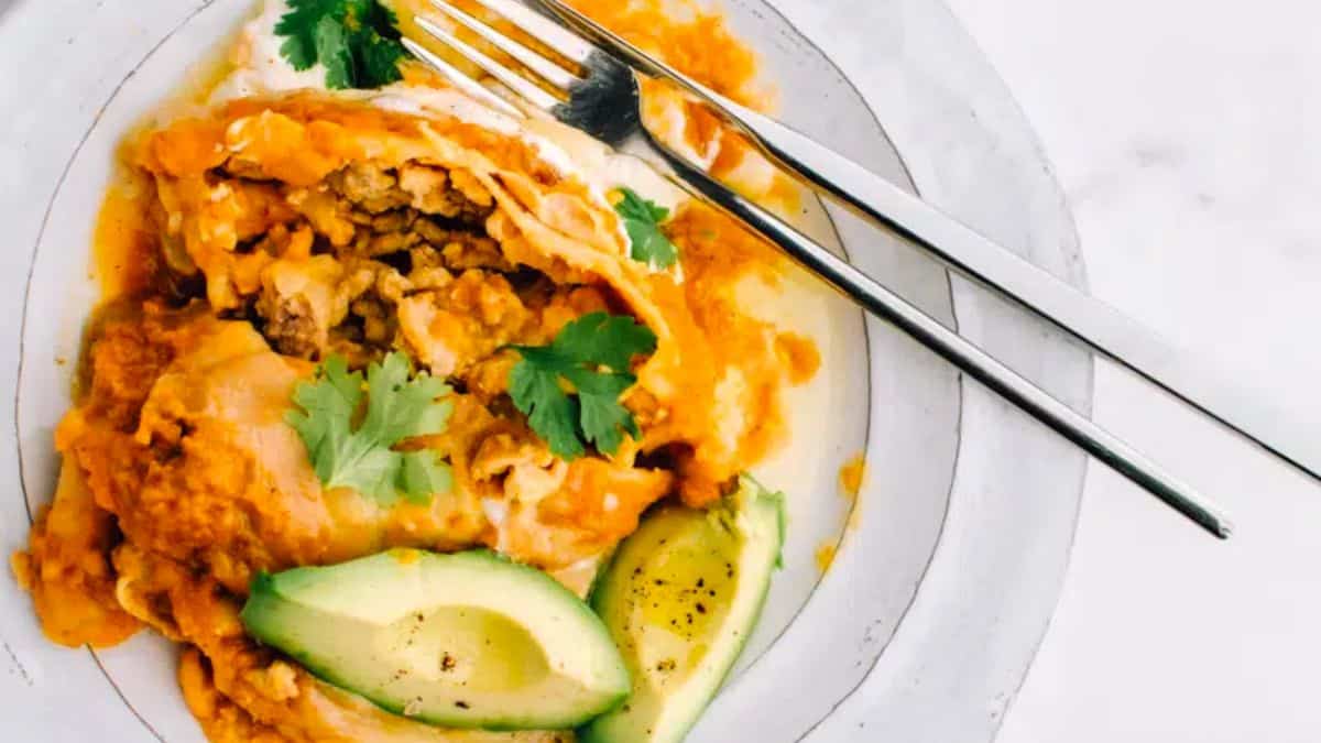 Crockpot Slow Cooker Chicken Enchiladas with Spicy Pumpkin Sauce