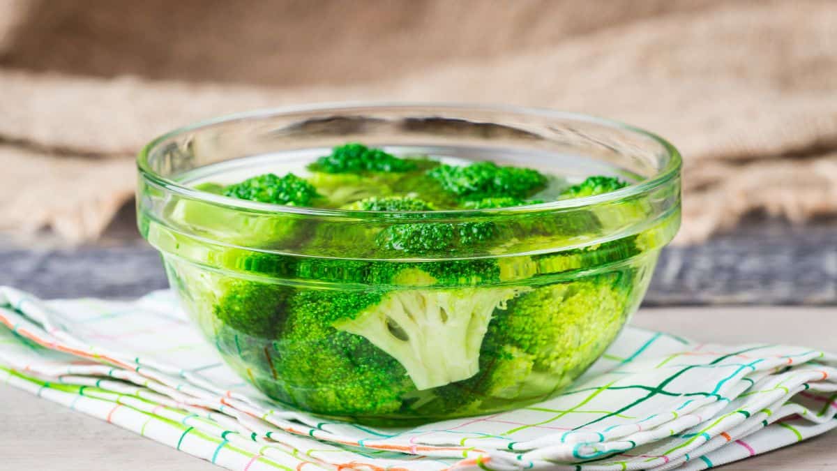 Broccoli in a bowl of water.