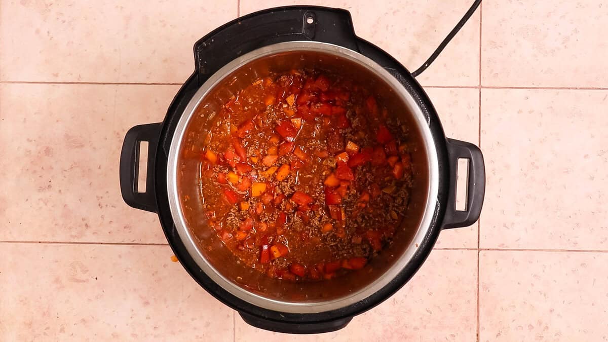 Instant pot bolognese in instant pot before pressure cooking.