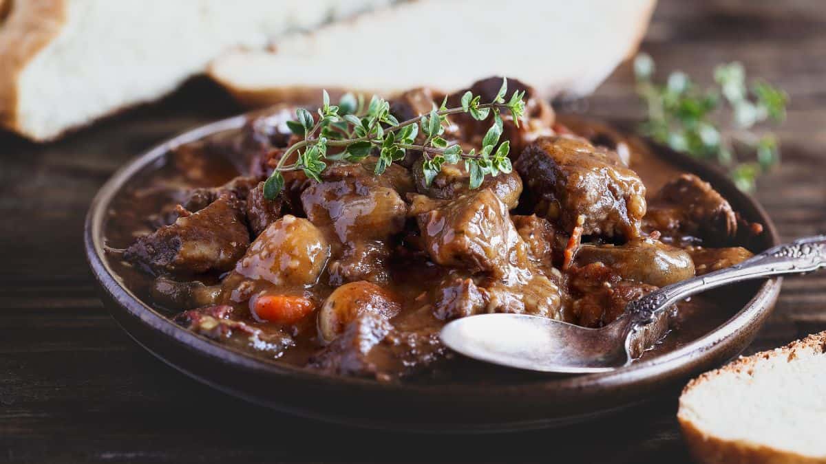 A plate full of beef bourguinon.