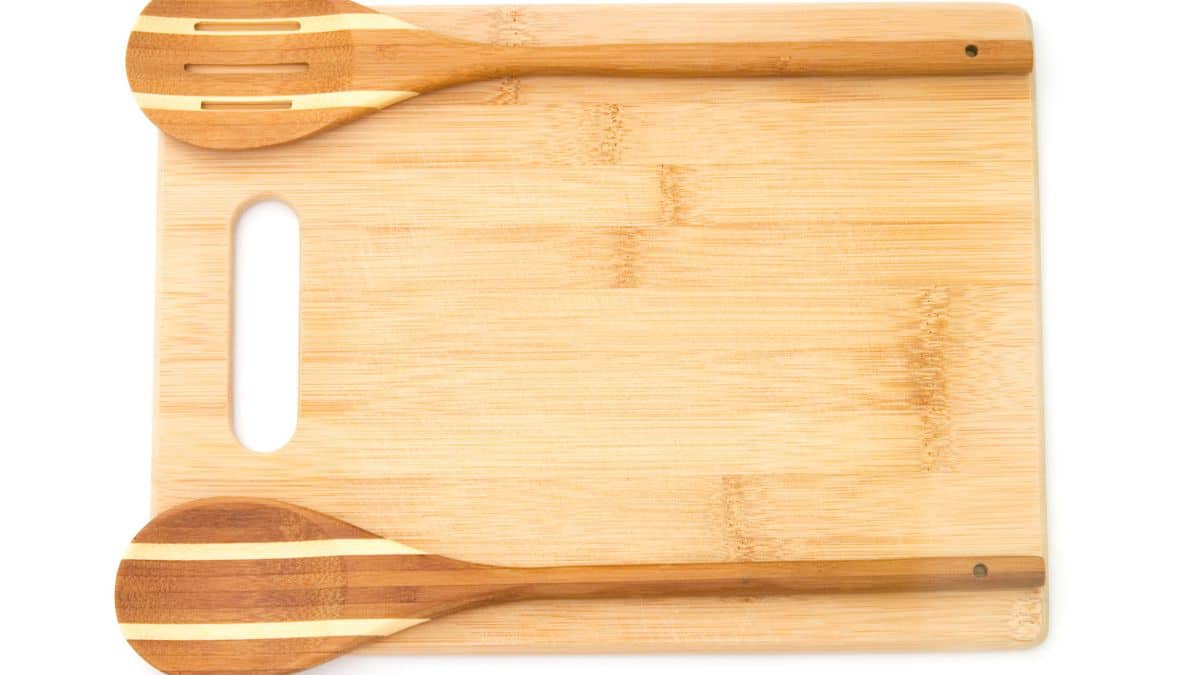Wooden chopping board and utensils.