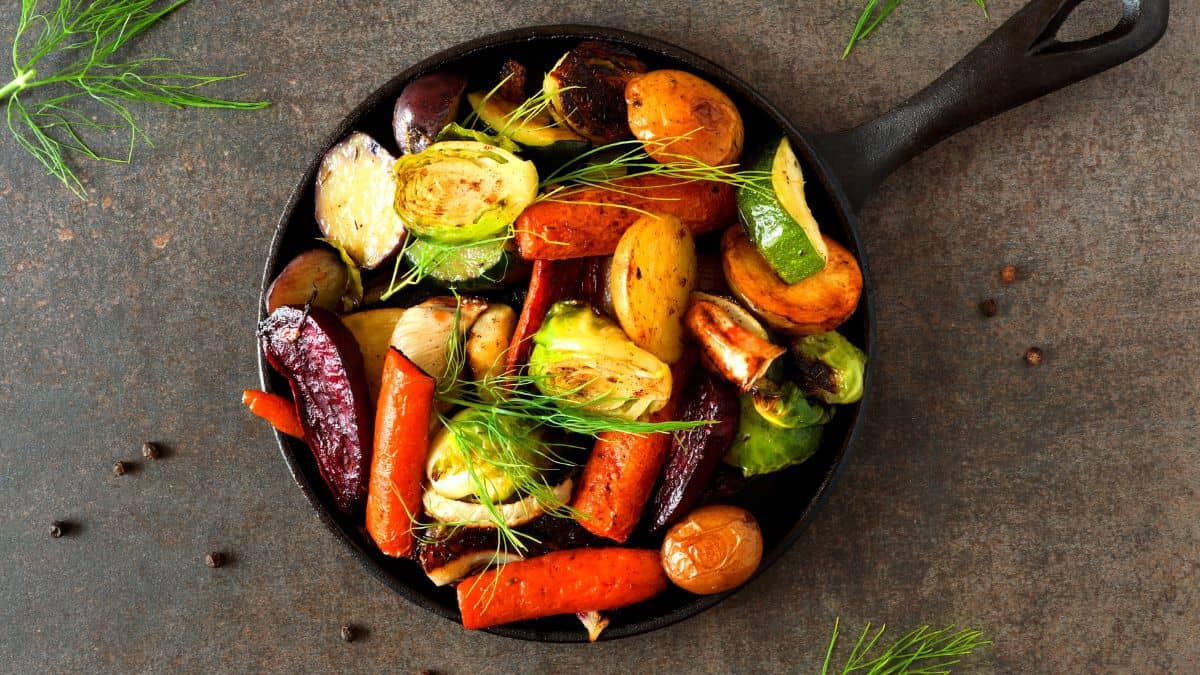 Roasted veggies in a cast iron skillet.