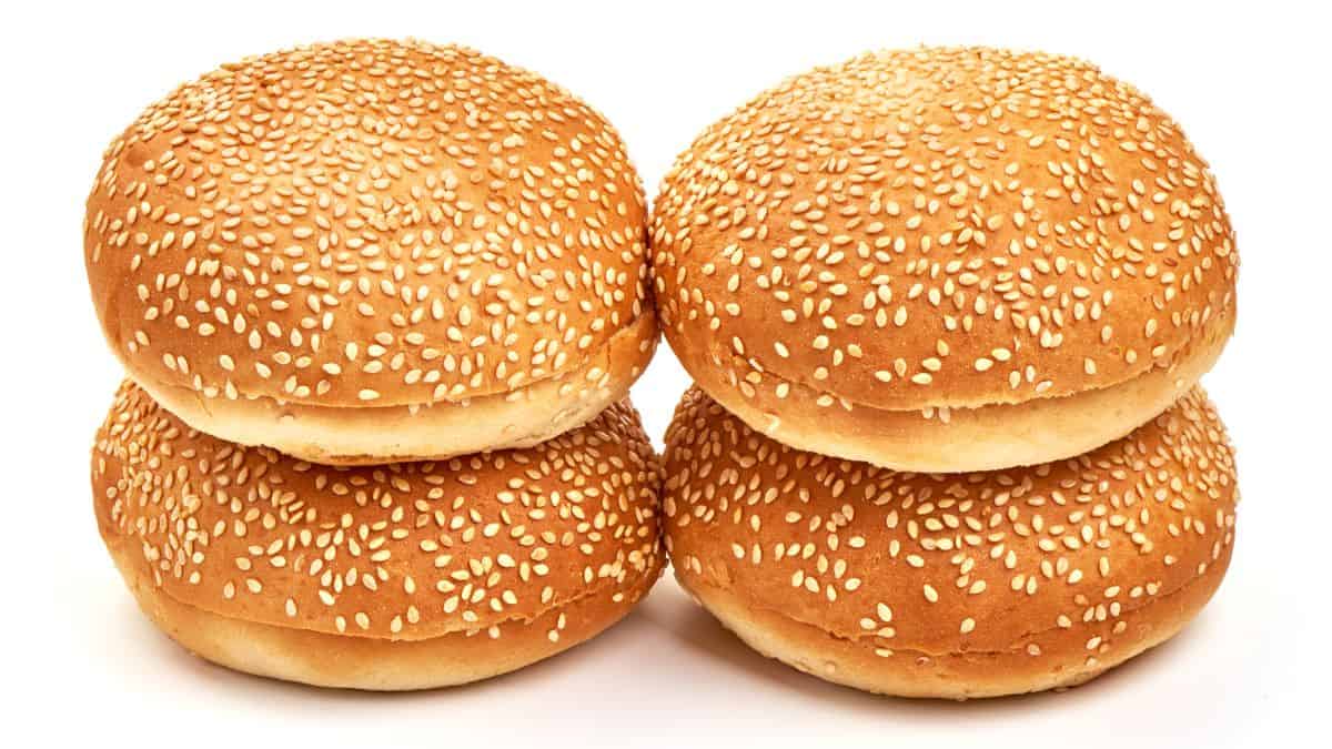 Four sesame seed buns.