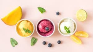 Three bowls with different ice creams.