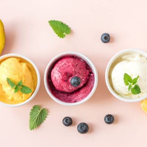 Three bowls with different ice creams.
