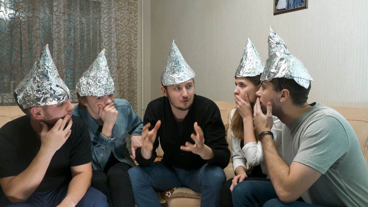 A group of people in foil hatts.